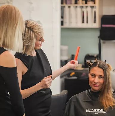 Sydney hairdressers Deb Bradshaw and Tearne with client; hair stylists at the Balmain hairdressing salon, Hair Angel; former location in Rozelle; specialists in precision haircuts styling colour correction balayage treatments. Sydney hairdressers Deb Bradshaw and Tearne with client; hair stylists at the Balmain hairdressing salon, Hair Angel; former location in Rozelle; specialists in precision haircuts styling colour correction balayage treatments.