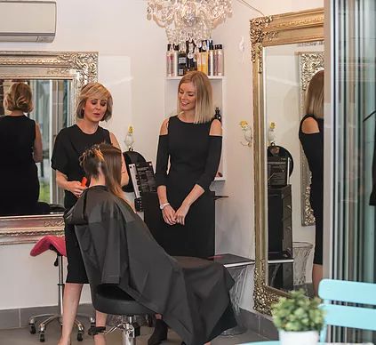 Australian hairdressers Tearne and Deb Bradshaw and client; stylists at the hairdressing salon Hair Angel; Darling St Balmain; previous location of Rozelle, inner west Sydney. Australian hairdressers Tearne and Deb Bradshaw and client; stylists at the hairdressing salon Hair Angel; Darling St Balmain; previous location of Rozelle, inner west Sydney.